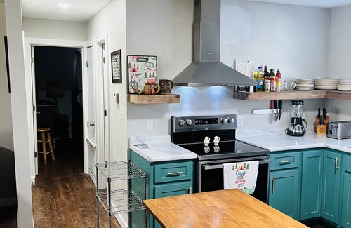 Wilburn Cabin | Cozy riverfront cabin with great outdoor space including a hot tub!