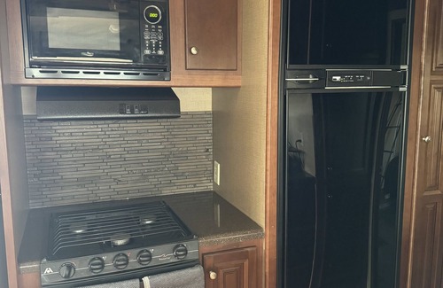 Gilbert House | Cozy RV tucked back in a quiet property with plenty of room to relax