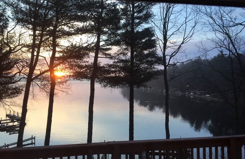 Pentwater Cabin | Cozy "Sailing" Cabin in the woods with Pentwater Lake frontage and access