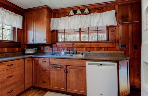 Rosman Cottage | Cozy Stay Near Brevard: Hot Tub & Creek Views