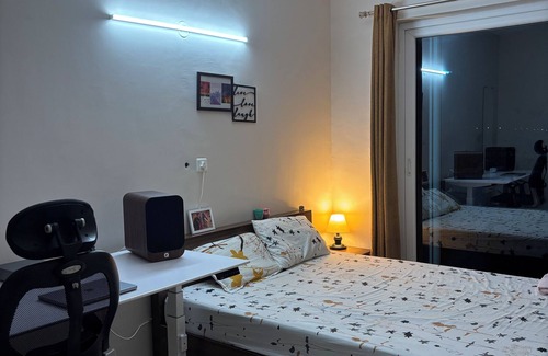 Agara Apartment | Cozy studio in pleasant Haralur with WiFi, AC and lake View