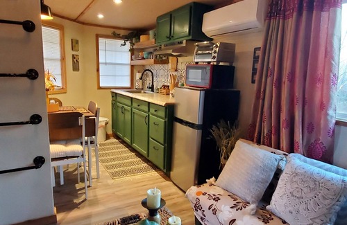 Mead Cabin | Cozy tiny cabin nested in the trees in a lake community, peaceful countryside.