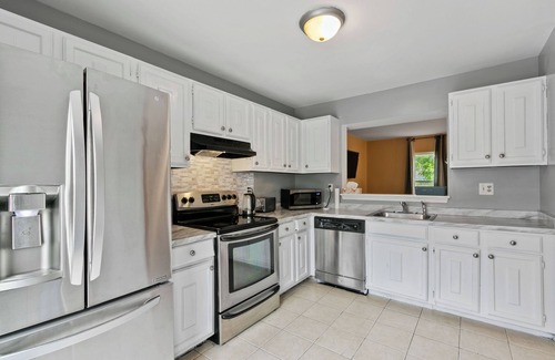 Fairland House | Cozy & Tranquil Getaway: Deck, Yard, Free Parking!