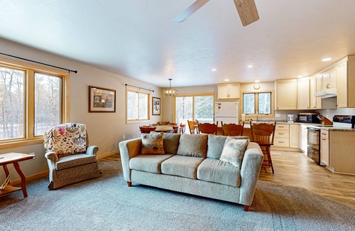 Presque Isle House | Cozy tree-lined home located near town, lakes, walking & bike trails, w/firepit
