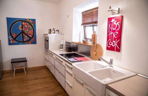 Deggendorf Apartment | Cozy vacation apartment (84 m²) with tiled stove and unique ambience