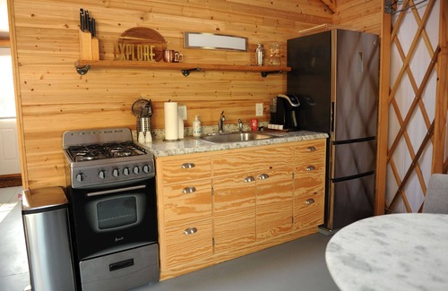French Lick Cottage | Cozy Waterfront Yurt with Heated Floors, full heat and AC, bathroom, Kitchenette