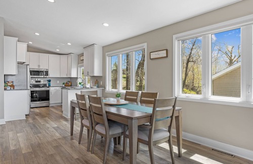 Faribault House | Cozy, year-round lake home with magnificent sunset views, lake access and dock.