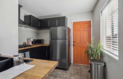 Logan Heights Apartment | Cozy3-bedroom apartment with WiFi, AC in lovely San Diego Downstairs.