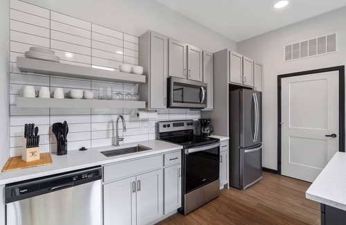 Lockerbie Square Apartment | CozySuites Mass with parking, lounge & roof deck #23