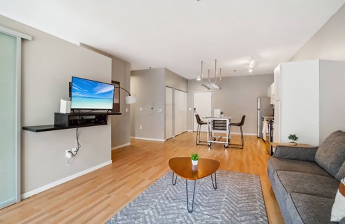 Mill District Apartment | CozySuites Mill District with pool, gym #08