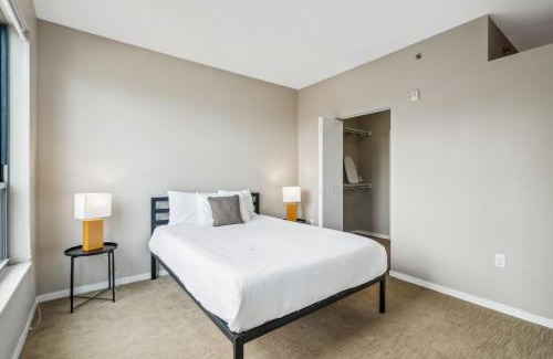 Mill District Apartment | CozySuites Mill District with pool, gym # 09