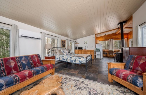 Bovey Apartment | Creative, Unique, Mini Carriage House Studio Tucked in the Woods on the shore of pristine Riley Lake