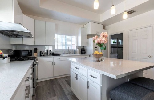 South San Gabriel House | Crowning Luxury: 3 King Suites, 3 Bath Retreat, Workstations, Lightspeed Internet, and On-Site Laundry with Parking.