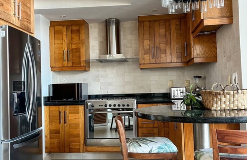 Colonia 5 de Diciembre Condo | Custom designed Penthouse with sweeping ocean views! 2BD Penthouse for rent in 5