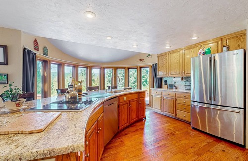 Foster House | Custom home 100 yds from Foster Lake with private hot tub, views, & firepit