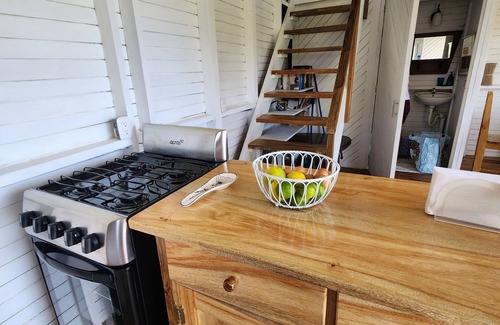 Rio Dulce Cabin | Cute & Cozy Caribbean Cabin on a farm.