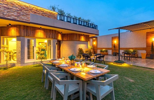 Ranjit Avenue Villa | D Amour by VEO - Part of StayVista