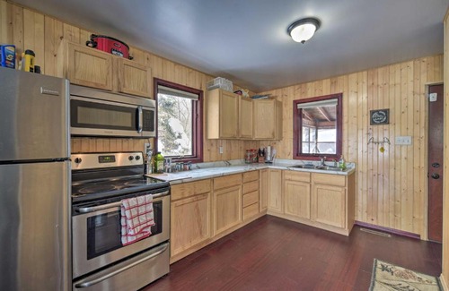 Danbury House | Danbury Cabin with Wraparound Porch on Lang Lake!