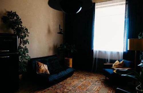Centrs Apartment | Dark & Moody Mid Century Apartment