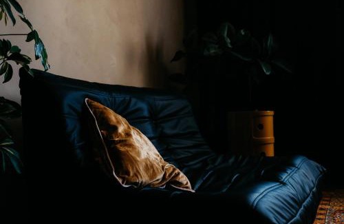 Centrs Apartment | Dark & Moody Mid Century Apartment