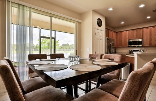 Trafalgar Village House | Delightful lakefront townhome with pool, volleyball, fast WiFi & AC
