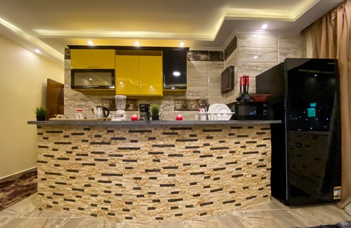 6th of October City House | Deluxe apartment in a building with an elevator with amazing Pyramids view
