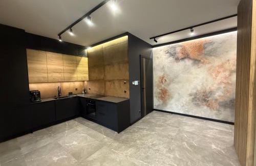 City Centre Apartment | Deluxe Industrial Apartment free Parking, Swimming Pool, Sauna & Gym