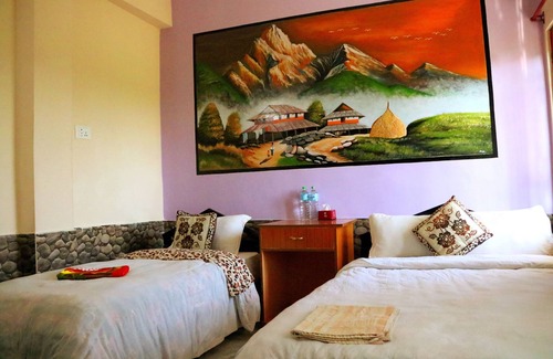 Sauraha Bed & Breakfast | Deluxe King size bed Room with Mountain view
