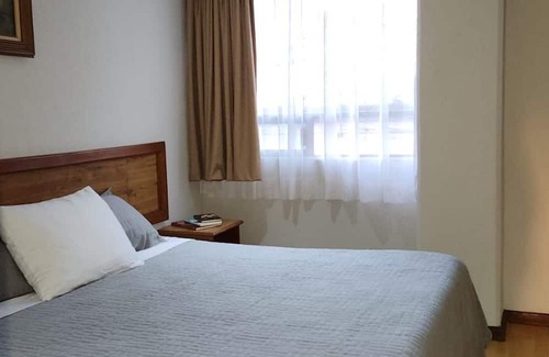 Toluca City-Centre House | Deluxe King size Bedroom