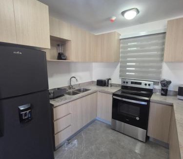 Eden Gardens Apartment | Deluxe One Bedroom Apartment in Kingston