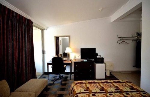 Somerset Hotel | DELUXE ROOM, QUEEN BED