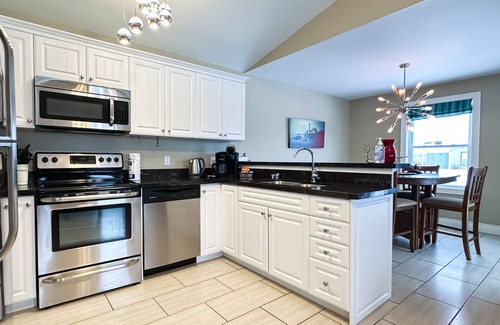 Stanley Bridge Villa | Deluxe Two Bedroom with Outdoor Hot Tub & Fireplace