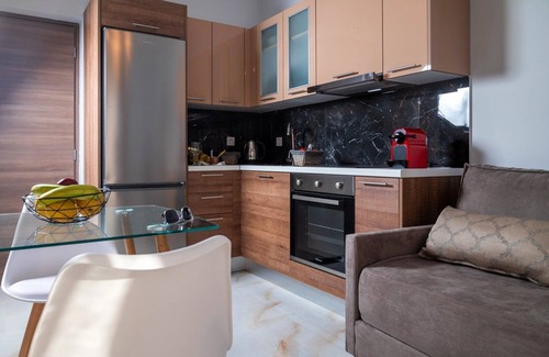 Ammoudia Apartment | Deluxe two bedroom family apartment with kitchen and balcony