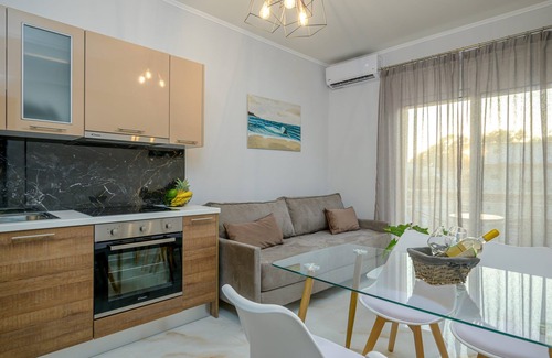 Ammoudia Apartment | Deluxe two bedroom family apartment with kitchen and balcony