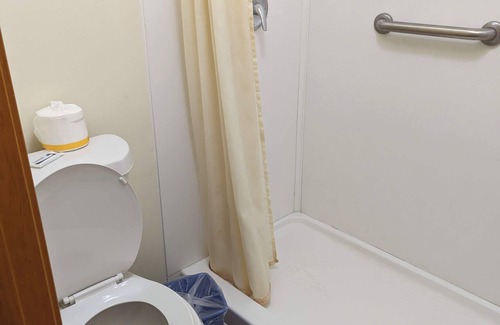 Perry Cabin | Deluxe two queen bed motel room packed with amenities.