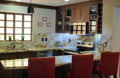 Flamingos Villa | "Deno's Villa" Updated Luxury 3rd floor Villa with Ocean, Beach & Pool Views!