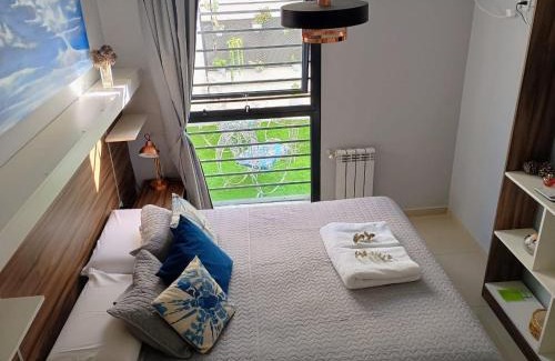 Villa Carlos Paz Apartment | Depto céntrico excelente ubicación, con cochera, pileta y patio