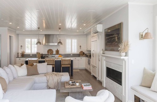 The Strand House | Designer 4-bedroom house in the heart of Downtown MB!