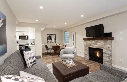 Village North Hotel | Designer Condo close to lifts. Large pool & hot tub, free wifi & secure parking