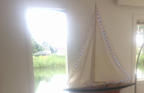 Municipality of Weesp Boat Rental | Designers houseboat in Amsterdam Gardens
