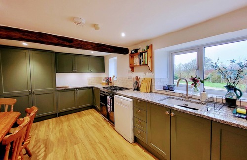 High Bickington Cottage | Devon Hideaway: Historic Barn, Jacuzzi & Expansive Exmoor Views