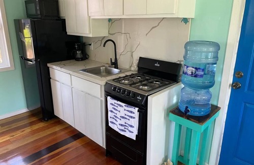 San Pedro Cottage | Digital nomad, tropical escape. Cheap monthly rates. Pets accepted @ Crellies