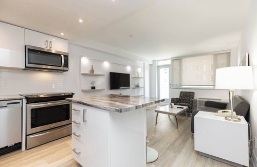 Bay Cloverhill Apartment | Discover an urban retreat in this spacious one-bedroom suite in Downtown Toronto