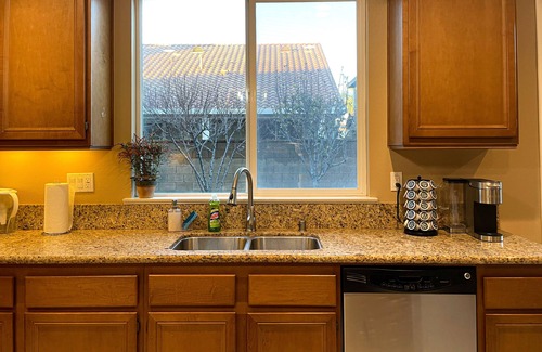 Mira Loma House | Discover comfort in our 5-bedroom retreat, just a hop away from Ontario Mills