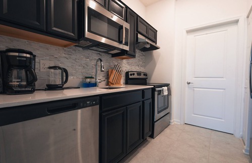 Haines City Apartment | Disney, Pool, Parks - World Class, Modern Suite