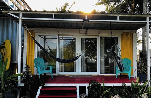 Islote Apartment | DK Backyard - Yellow Room