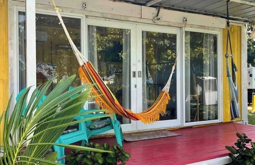 Islote Apartment | DK Backyard - Yellow Room
