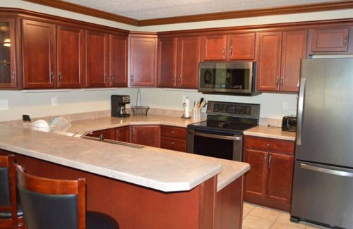 Arnolds Park Condo | Dock Holiday on Upper Gar Lake with Outdoor Pool