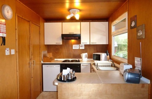 West Laroch Ski Chalet | Dog-friendly lochside chalet with balcony, stunning mountain views!