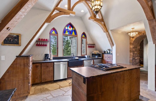 Sandpoint House | Dog-friendly mountain castle with a washer/dryer, private hot tub, & fireplace